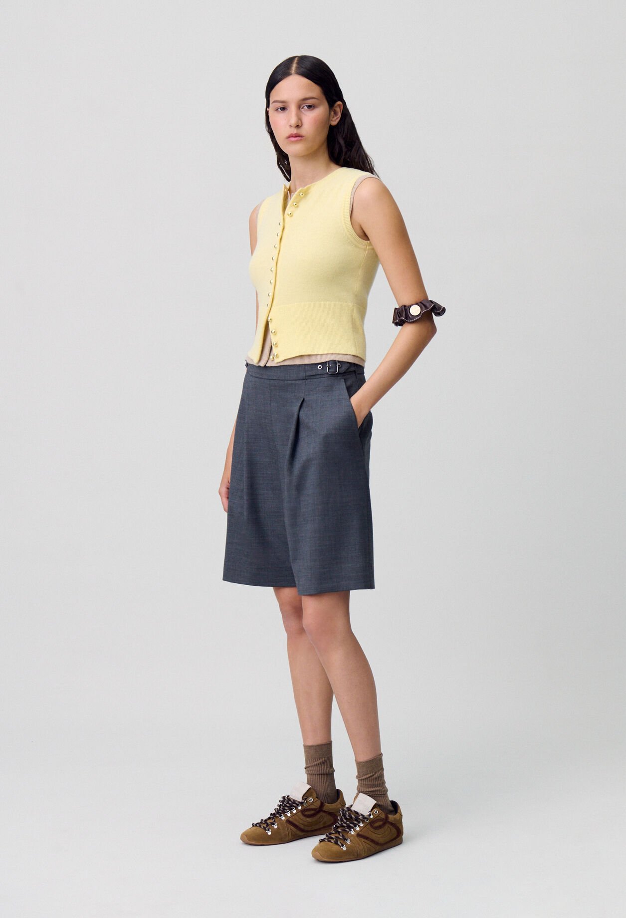 Bermudas cortos con pliegues