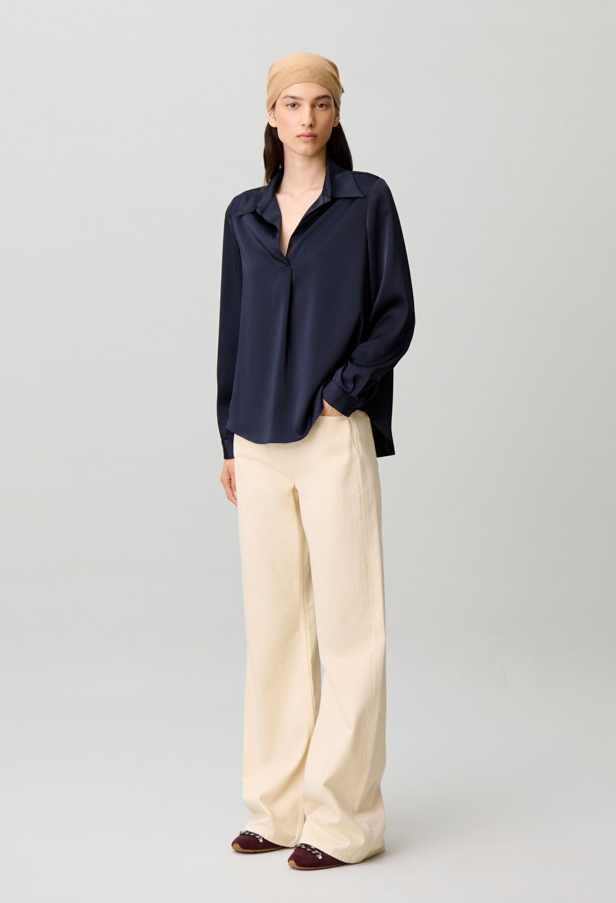 Blusa recta con pliegues